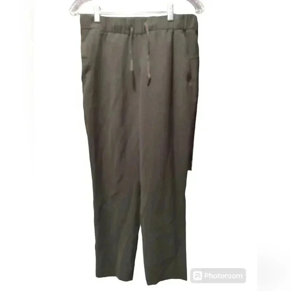 Lululemon On The Fly Pant *Woven 28" Dark Olive - Picture 6 of 8